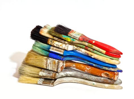 Paintbrushes on white background