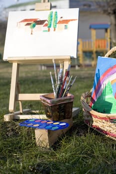 Canvas Easel and Paintbrushes in the park