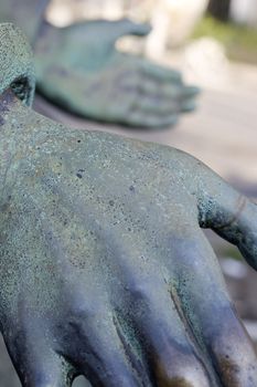 Hand of a bronze statue, Milan
