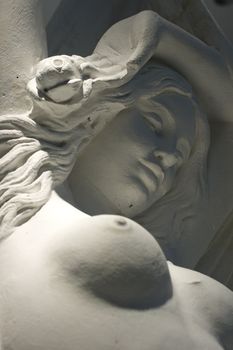 Detail of a sensual Woman statue