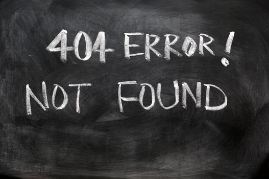 Webpage 404 error of not found written on blackboard