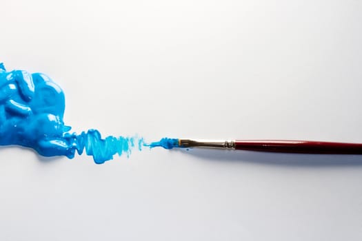 Paintbrushes with Blue Colors on white