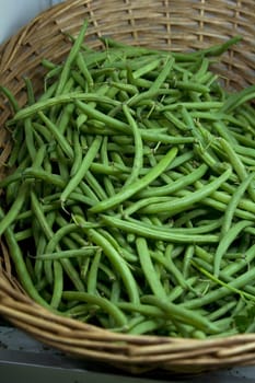 Fresh Green Beans inside a wicker basket