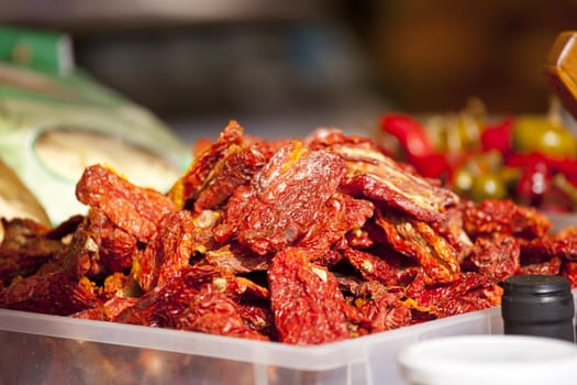 Dried tomatoes on plastic basket