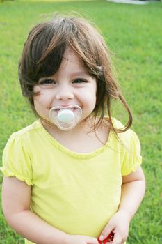 baby girl with pacifier