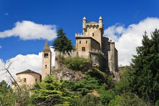 exterior of Saint-Pierre Castle and church in Aosta valley, Italy