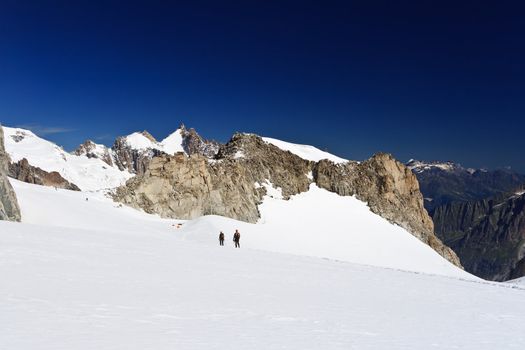 hikers on Mer de Glace glacier, Mont  Blanc massif