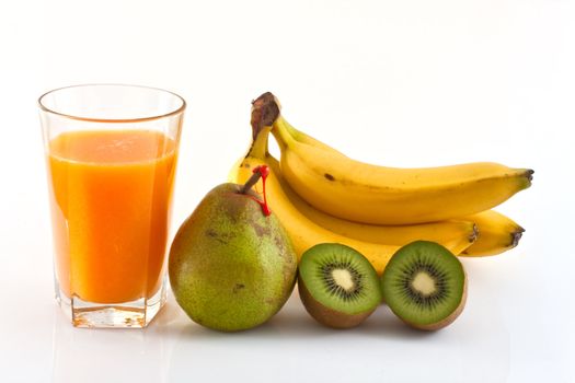 Decana pear, orange juice, bananas and and kiwi on white background