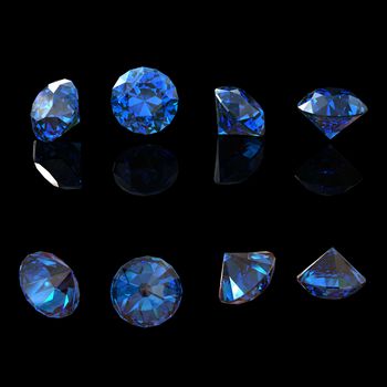 Round blue sapphire isolated on black background. Gemstone