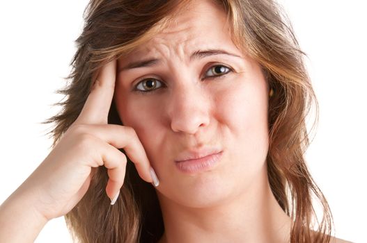 Woman suffering from an headache, holding her hand to the head