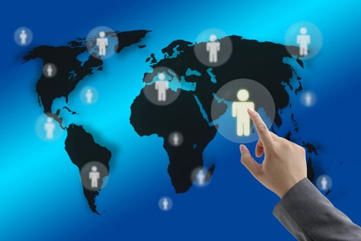 Businessman hand touching virtual screen interface with world recruitment background