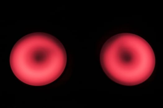 Two heated rings of an electric plate