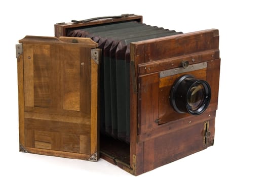Wooden retro the camera it is isolated on a white background