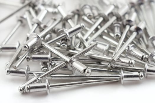 Aluminium rivets on a white background