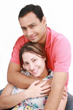 Young happy couple on white background