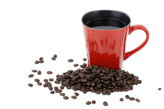 Handmade square red ceramic mug filled with hot black coffee with beans over white