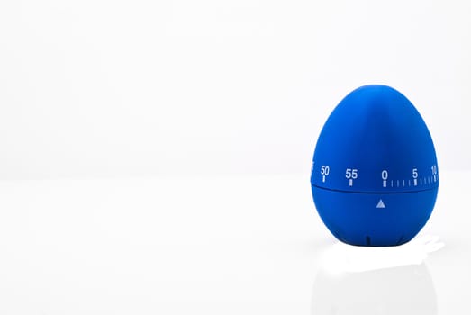 kitchen egg timer blue isolated on white background