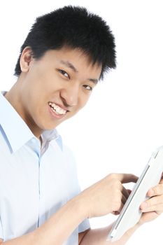 Smiling man pointing on the tablet in a close up shot