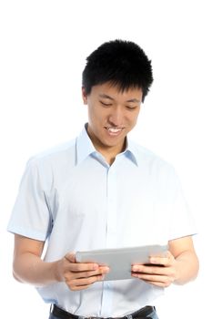 Happy man playing games through his tablet isolated on white