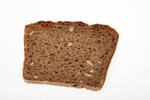 Slice of dark bread isolated over white 