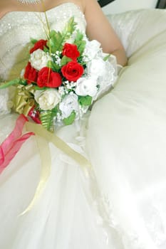 bridal bouquet of flowers held by bride