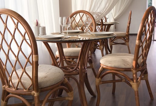 The served tables and chairs at restaurant