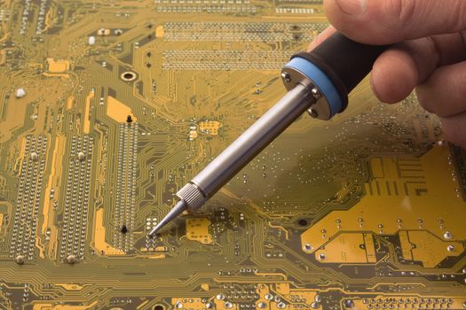 Process of repair of the electronic device close up