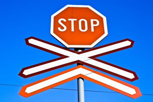 Stop sign with a clear blue sky