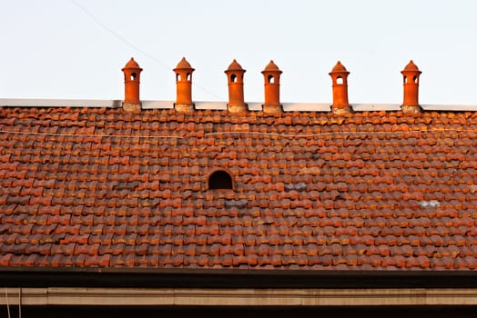 Six chimneys on tiles roof