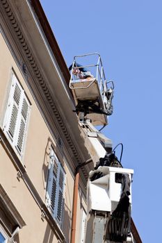 Worker on a mobile crane