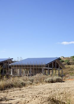 Solar panels in a house under construction, Italy