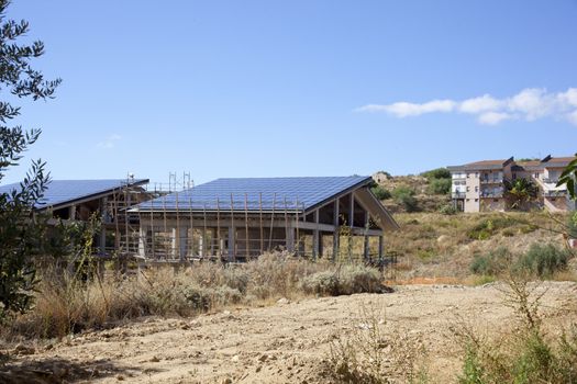 Solar panels in a house under construction, Italy