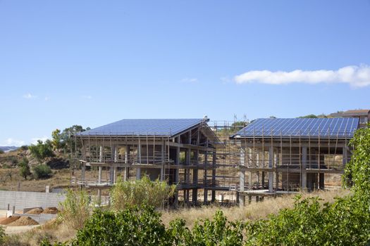 Solar panels in a house under construction, Italy