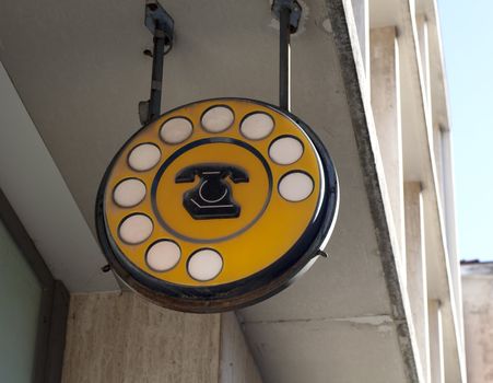 Old italian public telephon sign