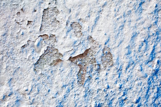 Blue color on a white wall