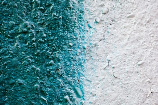 Green color on a white wall