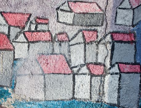 Graffiti, stylized houses painted on the wall