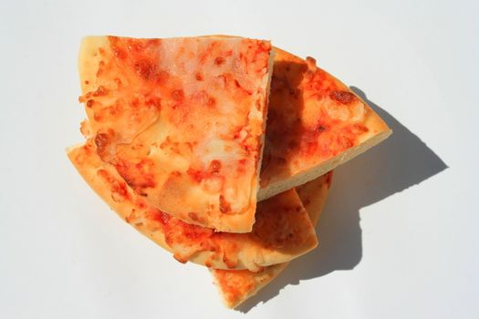 Close up of a mini cheese pizza slices.
