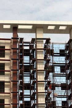 construction workers in action on a modern building vertical