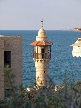 Oriental Muslim Mosque tower with the the Mediterranean  background Jaffa Israel      