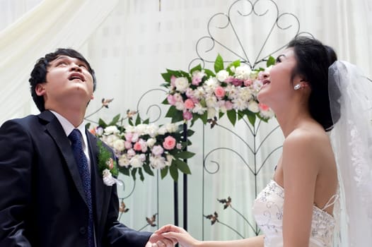 a young couple on their wedding day