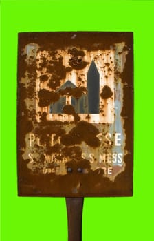 Rusty urban sign of a church isolated on a green background