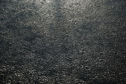 Black background texture asphalt.