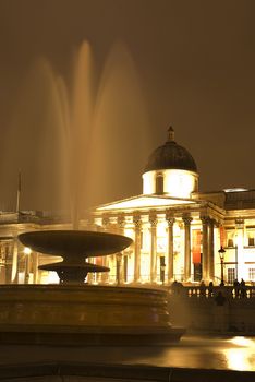 Trafalgar square at night London UK