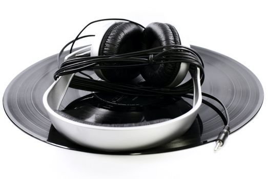 a headphone on a vinyl record