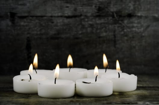 white candle in circle