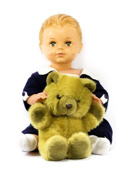 a doll and a teddy bear