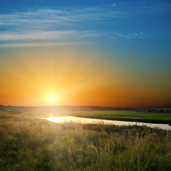 golden sunset over river