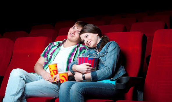 couple in a movie theater, watching a 3D movie