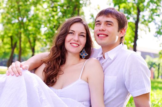 couple hugging in the park, have a good time together